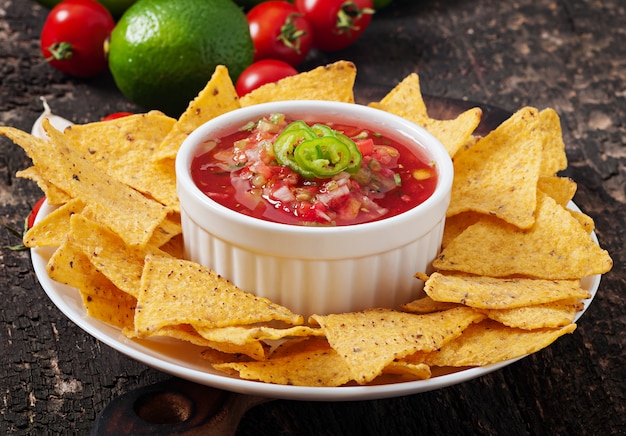 Free Photo mexican nacho chips and salsa dip in  bowl 