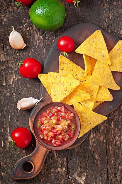 Free Photo mexican nacho chips and salsa dip in  bowl 