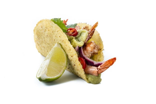 Free photo mexican tacos with shrimpguacamole and vegetables isolated on white background