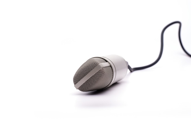 Free photo microphone with a cable isolated on a white