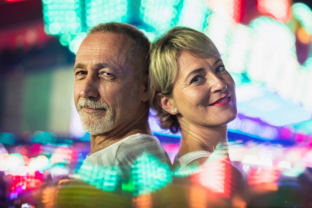 Mid aged couple enjoying the festival