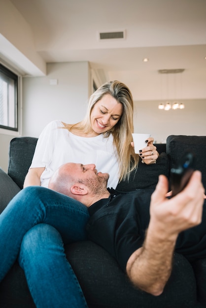 Mid aged couple in love at home