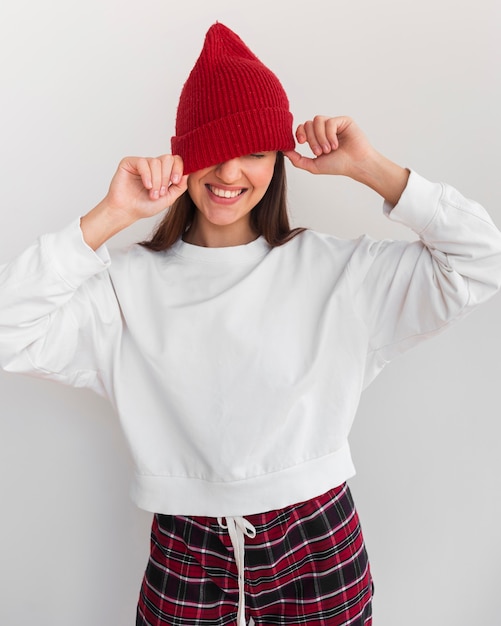 Free Photo mid shot young woman with hat smiling