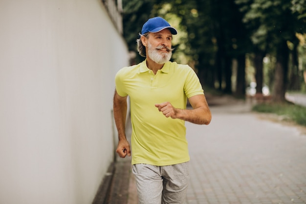 Middle aged man jogging in park