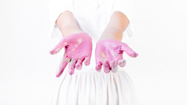 Free photo midsection view of a woman's messy hand with paint