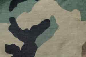 Free photo military camouflage fabric textured background