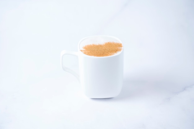 Free photo milk beverage with cinnamon on top