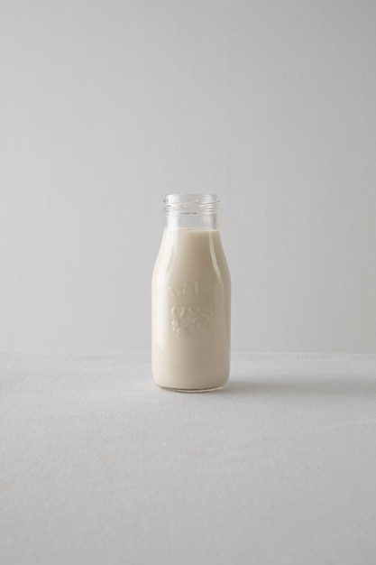 Milk bottle on white background