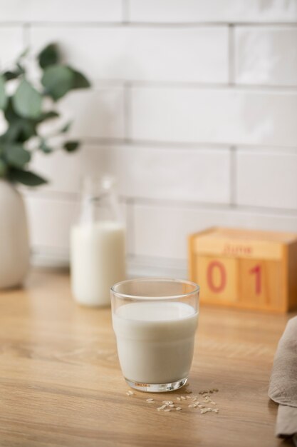 Milk glass and seeds arrangement on table