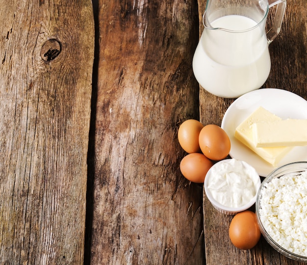 Free photo milk products on rustic wooden table