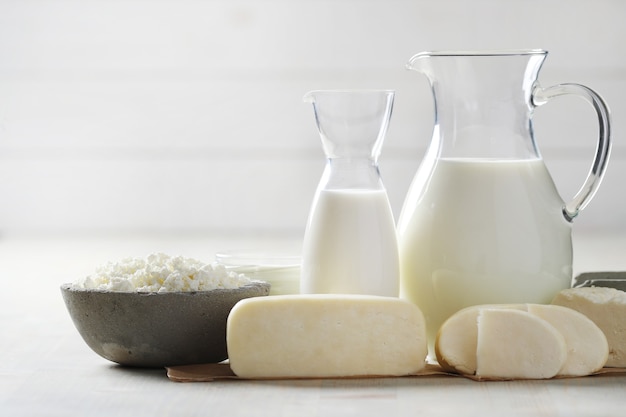 Milk products on wooden table