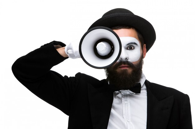 Mime as business man with a megaphone