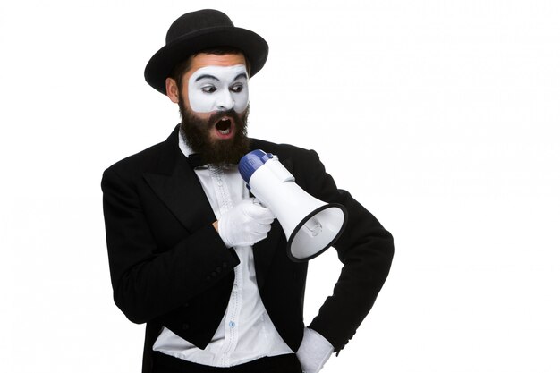 Mime as business man with a megaphone