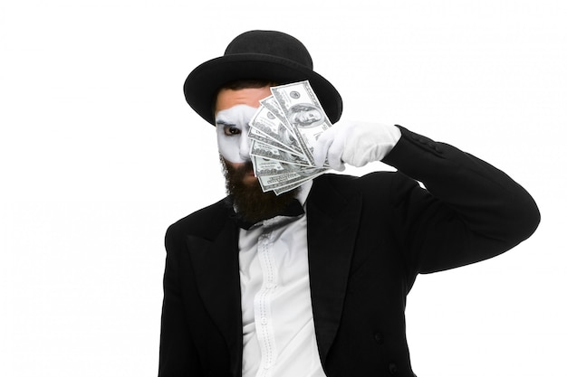 Mime as businessman holding money