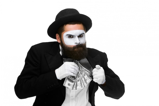 mime as businessman putting money in his pocket