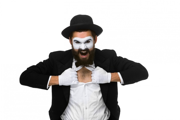 Mime as a businessman tearing his shirt off