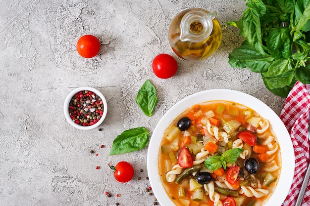 Free Photo minestrone, italian vegetable soup with pasta. vegan food. top view. flat lay.