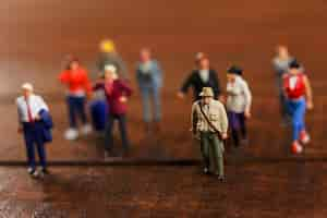 Free photo miniature people travelling