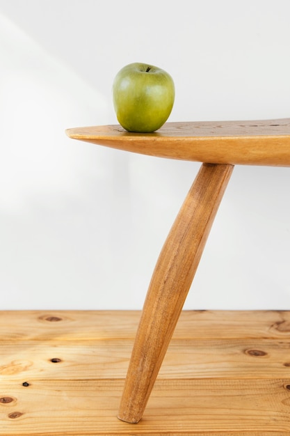 Free photo minimal abstract concept apple on table