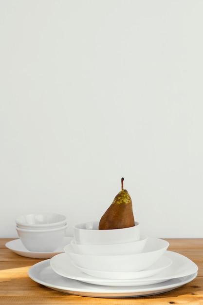 Free photo minimal abstract concept pear in bowls