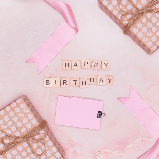 Free photo minimal pink arrangement with birthday items