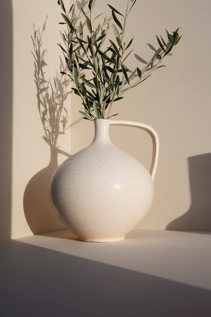 Minimal white vase with plants