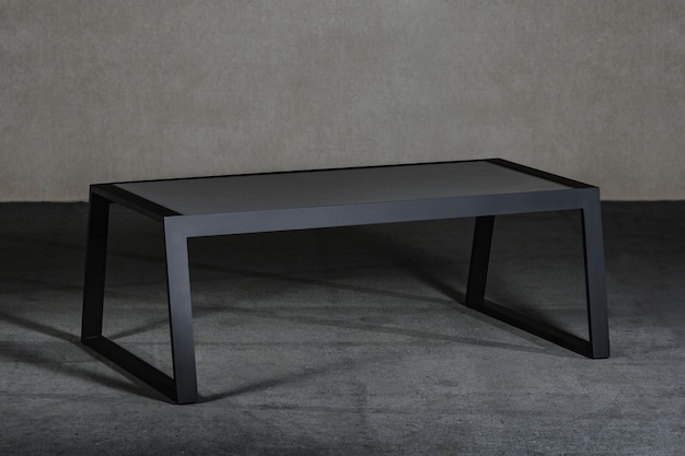 Free Photo minimalist black coffee table in a room under the lights