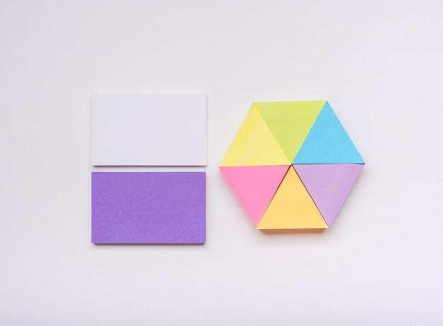 Free photo minimalist business card and colourful post-it notes