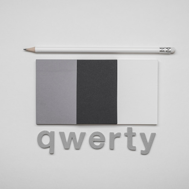 Free photo minimalist business cards qwerty word concept