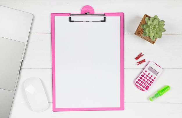 Minimalist desk with clipboard mockup