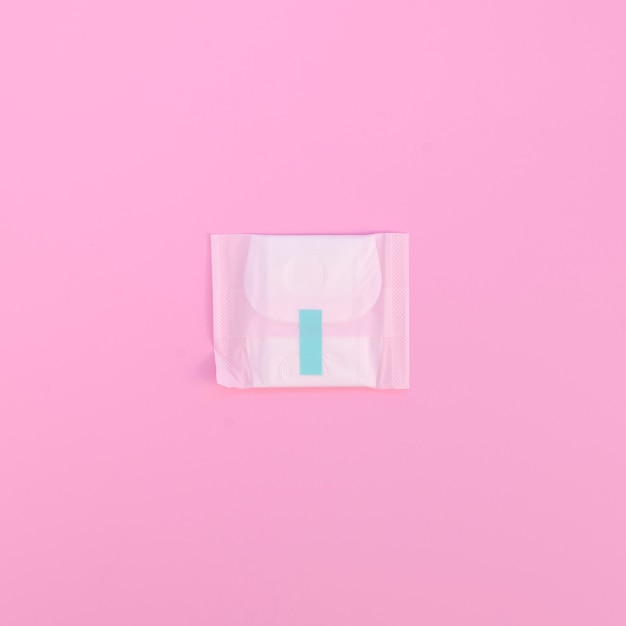 Minimalist wrapped pad on pink background