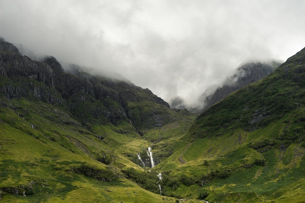 Mist descending on the mountains of Scotland during daytime