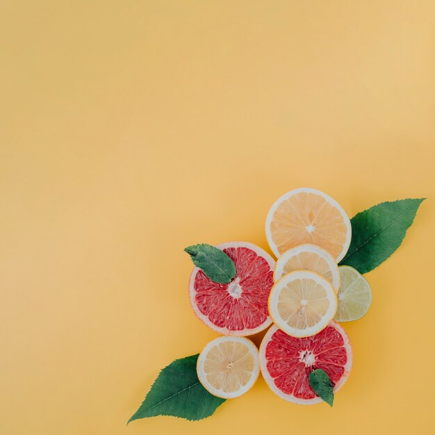 Free Photo mix of citrus fruits on table copy-space