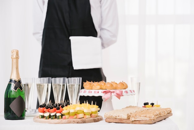 Mix of food and drinks set on a table