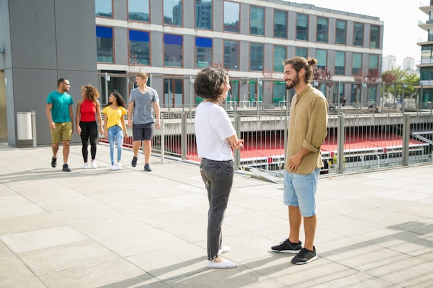 Mix raced students walking around university campus