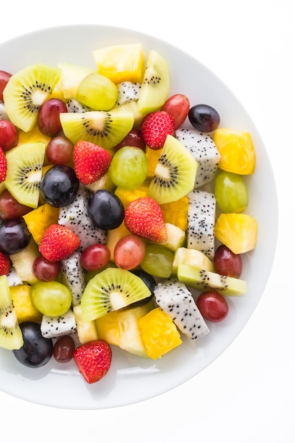 Free photo mixed fruit in white plate