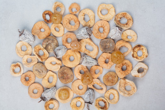 Free Photo mixed healthy dried fruits with on marble background. high quality photo