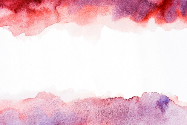 Mixed red and purple watercolor brush splash on white background