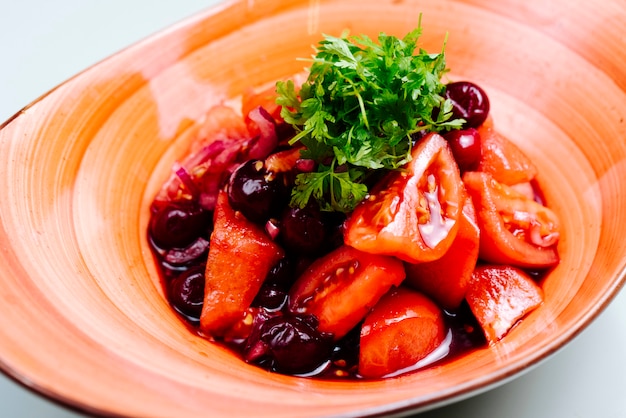 Mixed salad with cherry and tomatoes