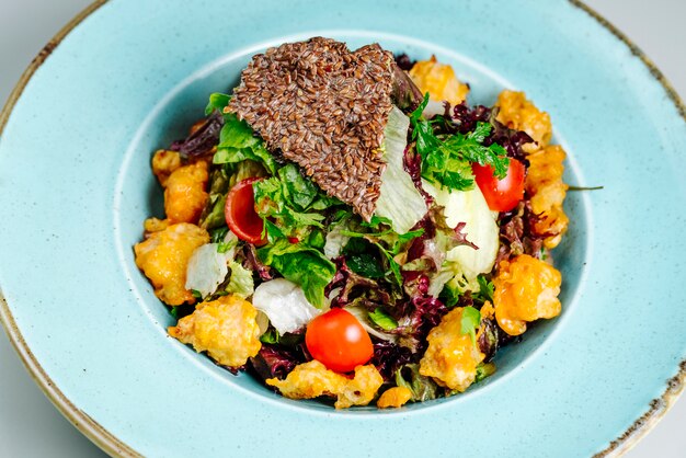 Mixed salad with vegetables and herbs