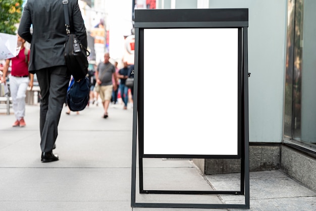 Free photo mobile mock-up billboard on sidewalk