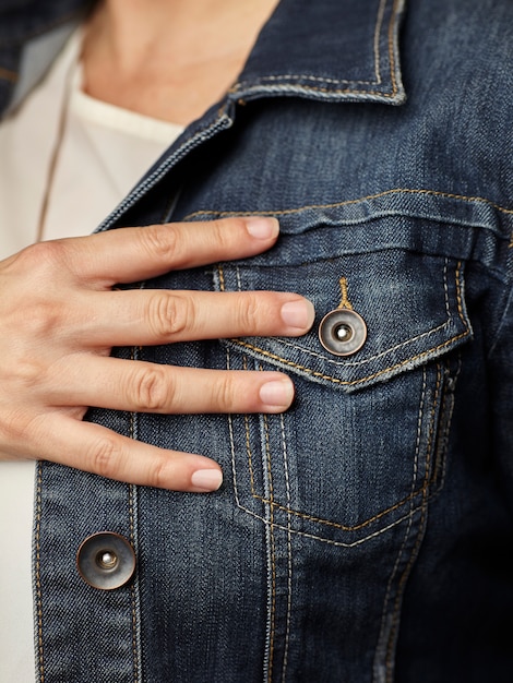 Free photo model details wearing blue denim jacket