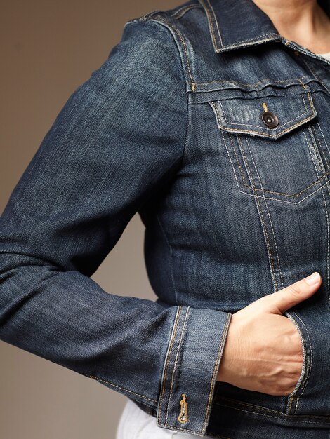 Model details wearing blue denim jacket