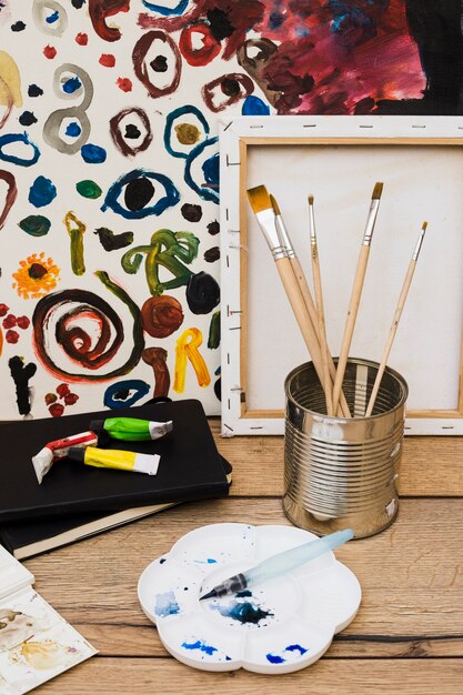 Modern artist concept with brushes and colorful paint