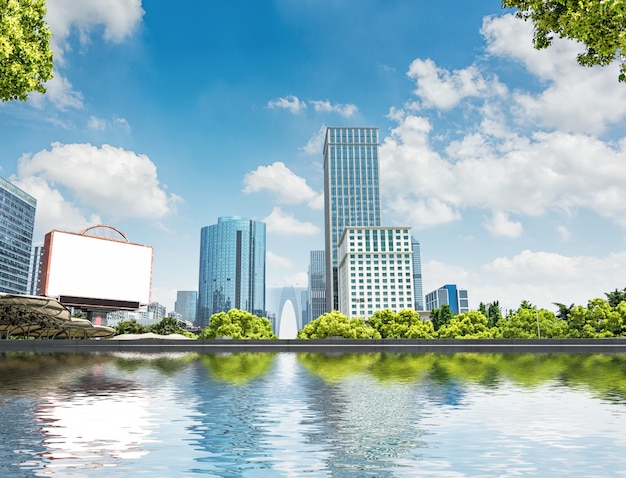 Free Photo modern buildings at riverbank