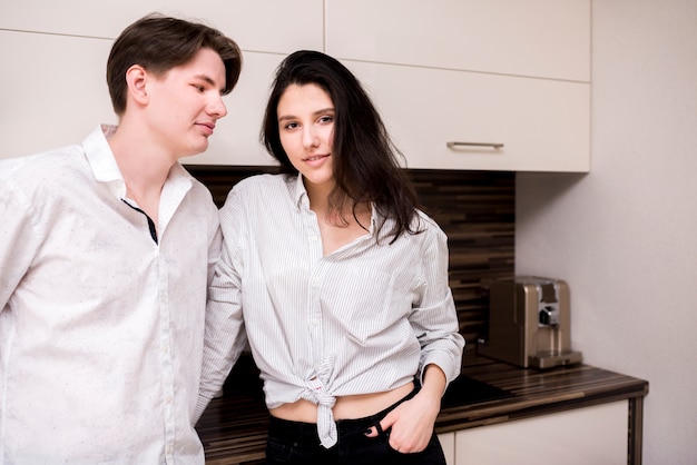 Modern couple in kitchen