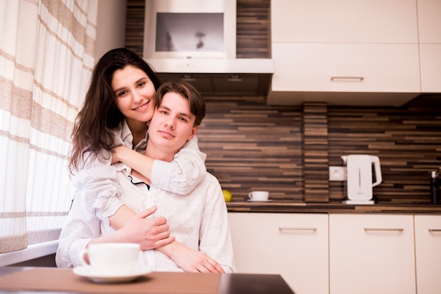 Modern couple in kitchen