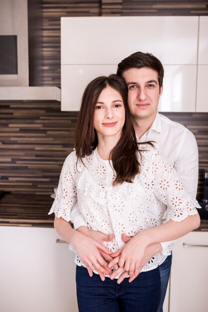 Modern couple in kitchen