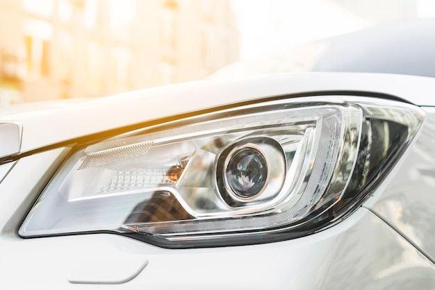 Modern led headlight of white automobile 