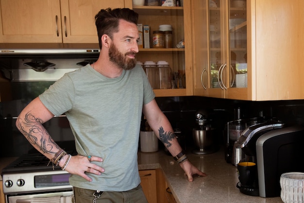 Modern man spending time in the kitchen